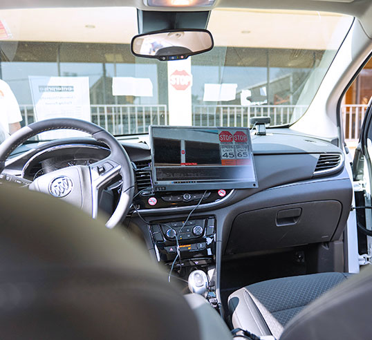 Inside of testbed vehicle with screen