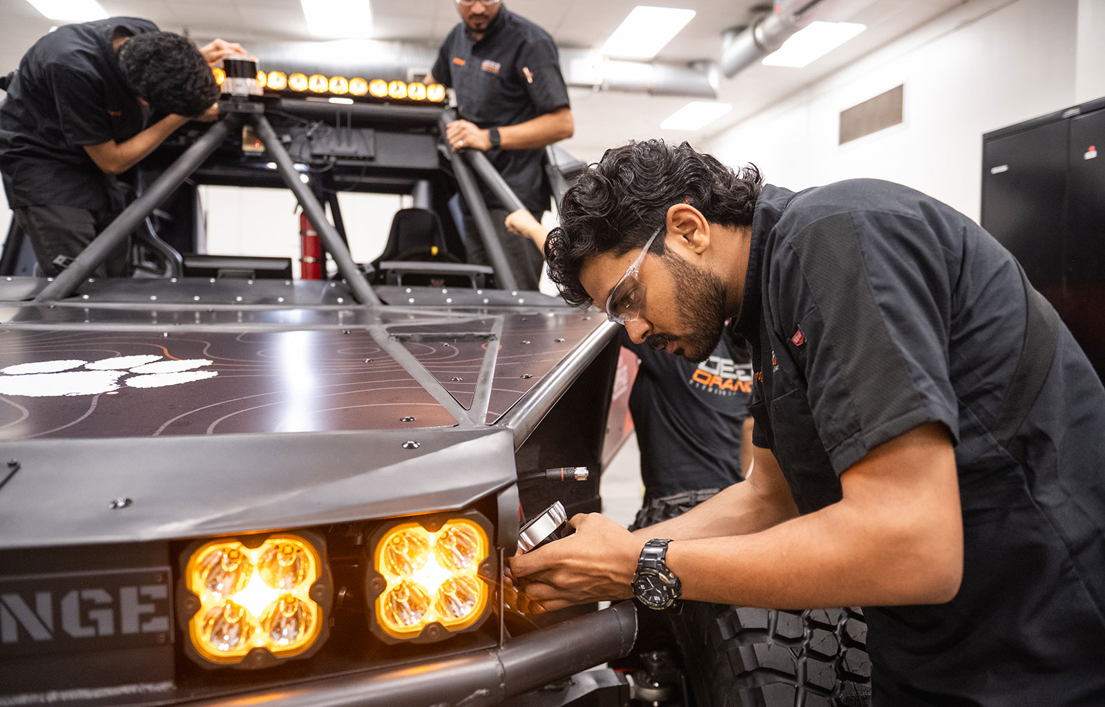 Students actively working on vehicle prototype