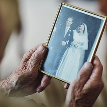 Person looking at an old photo