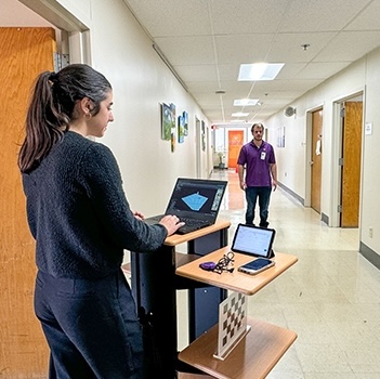 People walking in a hallway