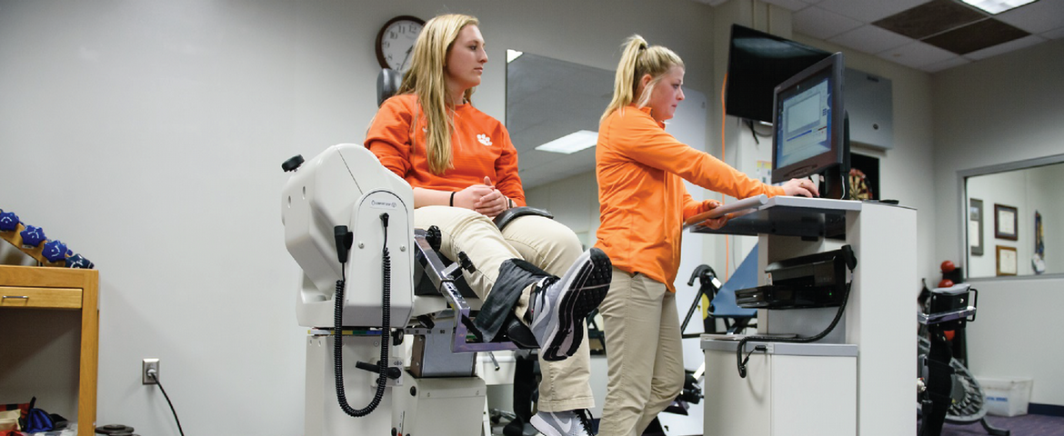 A Clemson research racecar accelerates and the background is a blur