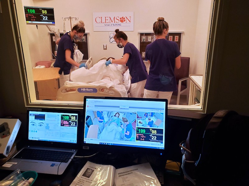 Clemson Nurses getting instruction for the sim lab