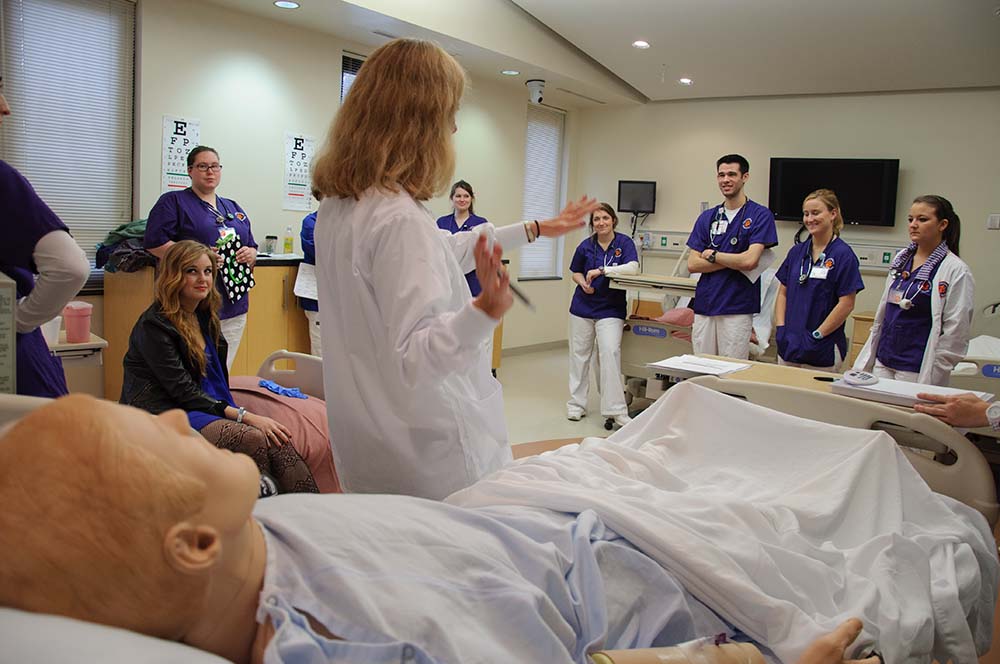 Clemson Nurses getting instruction for the sim lab
