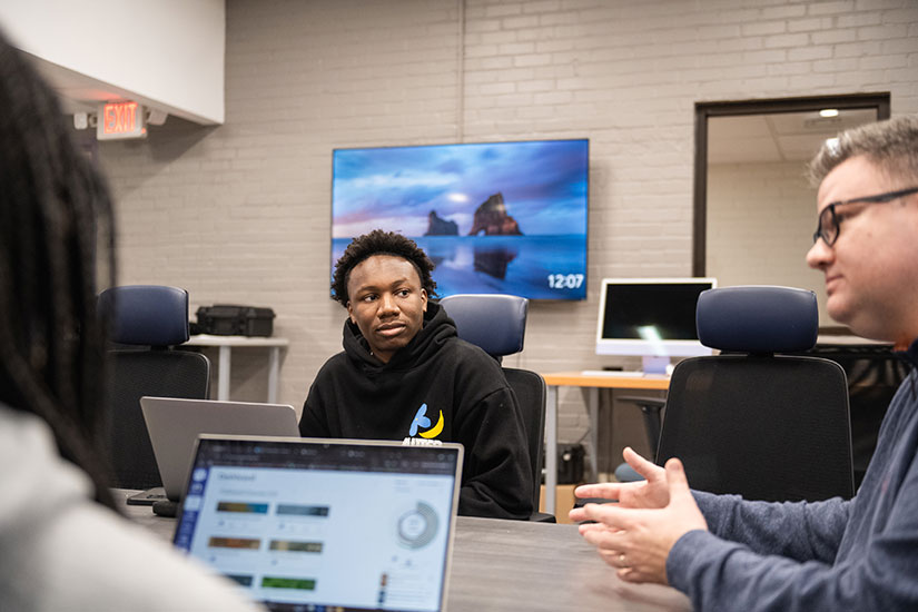 McNeese talking with students