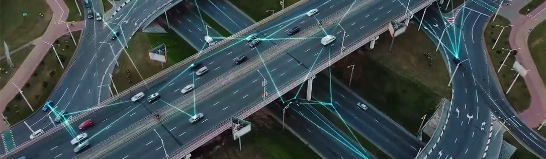 Traffic on an extensive highway with ai lines crisscrossing the roads.