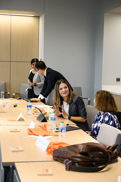 Women talking in conference.