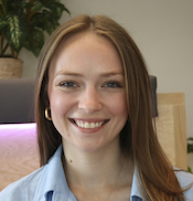 Smiling woman in a blue shirt.
