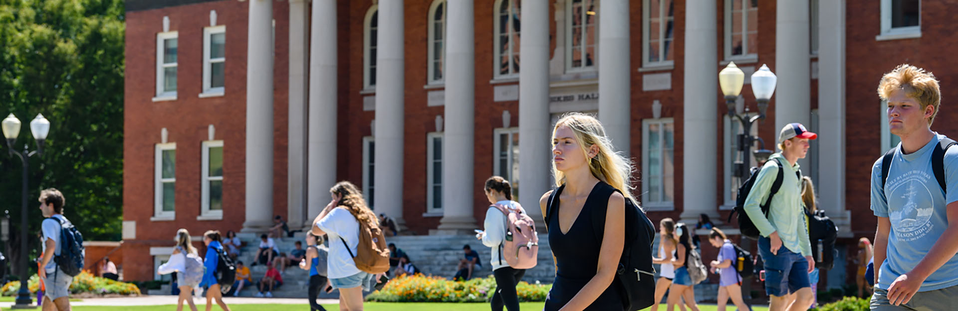 Students walking in front of Sikes Hall