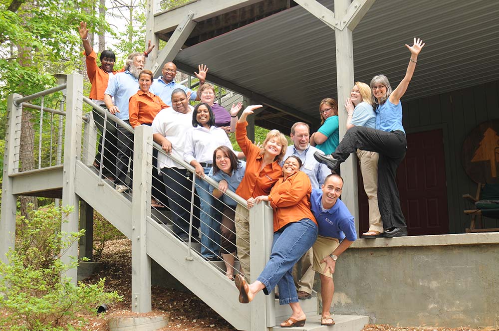 People standing on cabin stairs