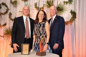 Dana and Nancy Garrison and President Clements