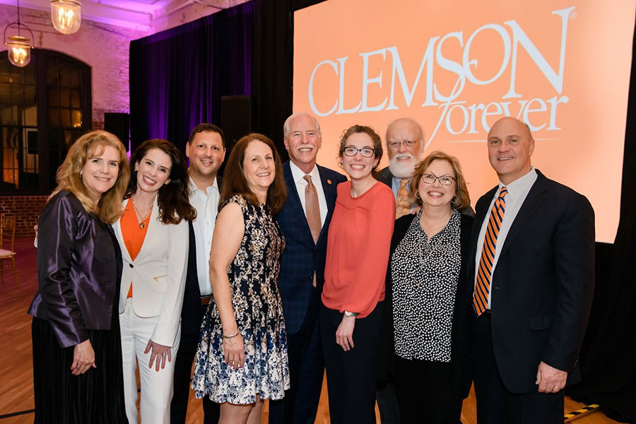 Group photo including Dean Wendy York, President Clements and Dan and Nancy Garrison.