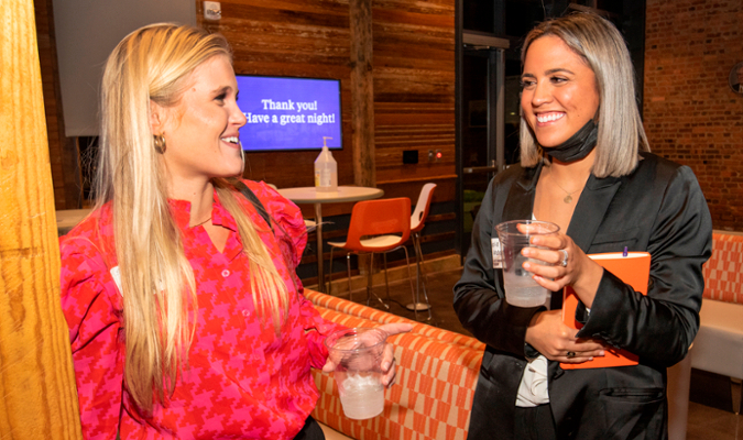 Two women at networking event
