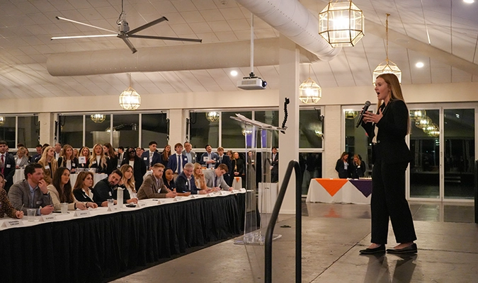 Three students posing for picture