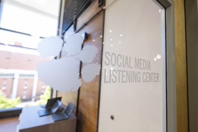 Social Media Listening Center logo on glass