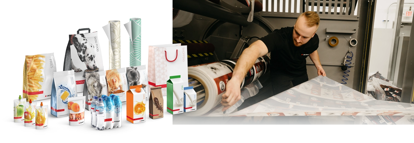 Man working on print machine and examples of printed packaging.