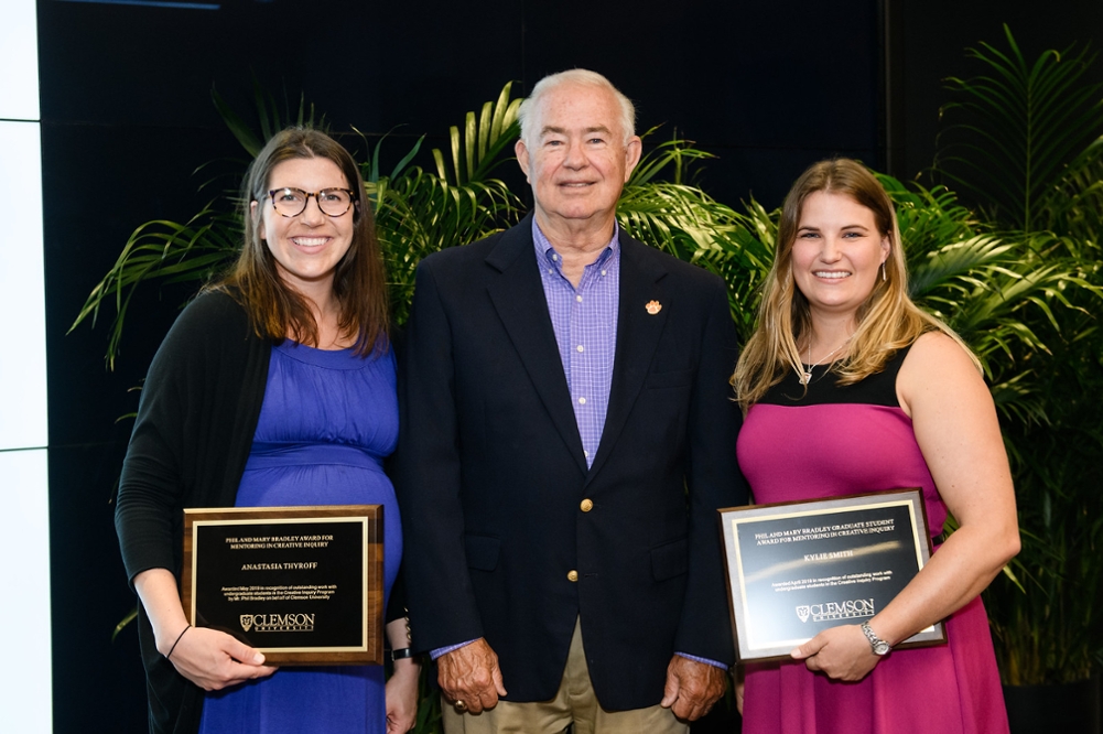 Anastasia Thyroff and Kylie Smith (2019 recipients of the Bradley Award) with Phil Bradley at the University Awards Ceremony