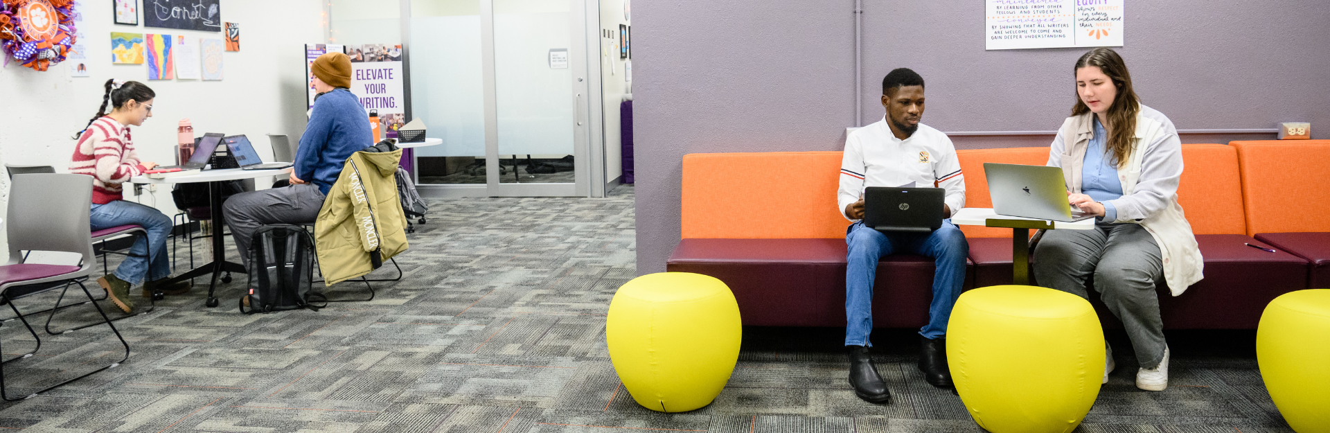 Tutors help students within the new Writing Lab space.