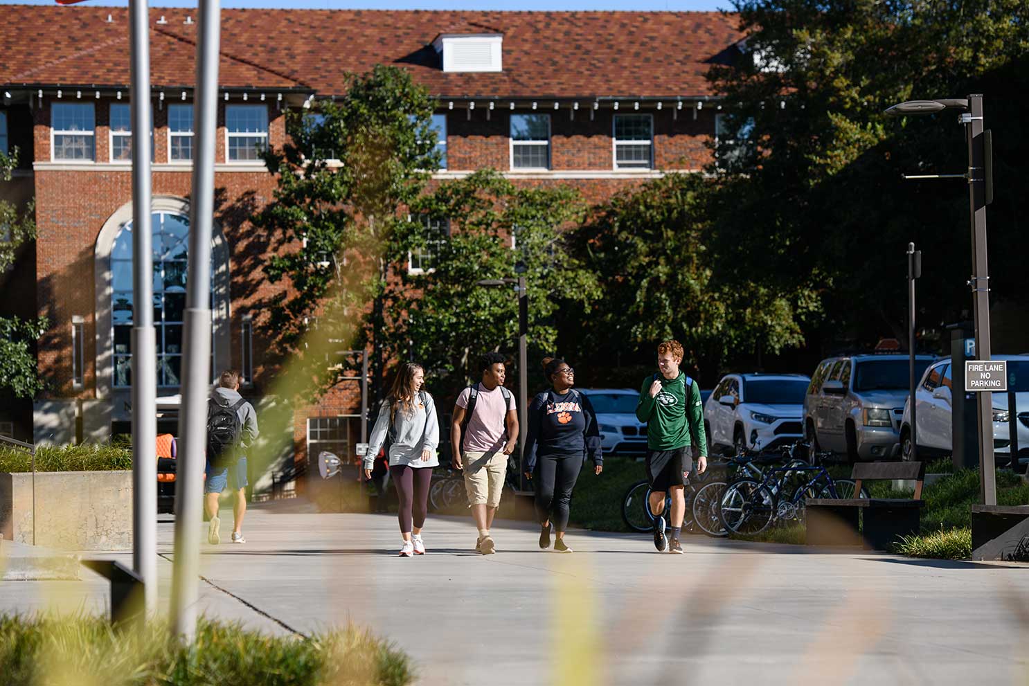 Students walking outside near Cribbs Hall on campus