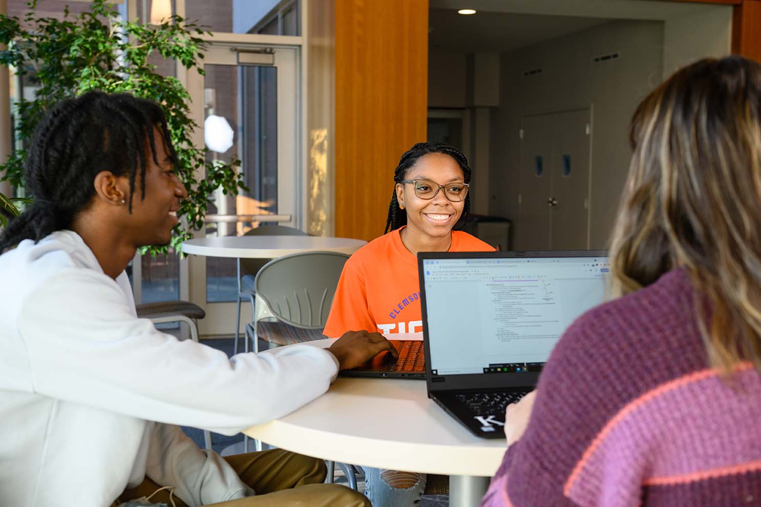 Honors students studying together in the Great Hall.