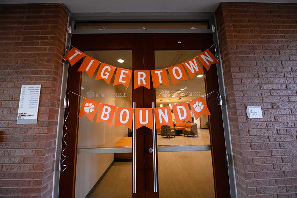 Tigertown Bound banner on the Clemson Honors Center main doors