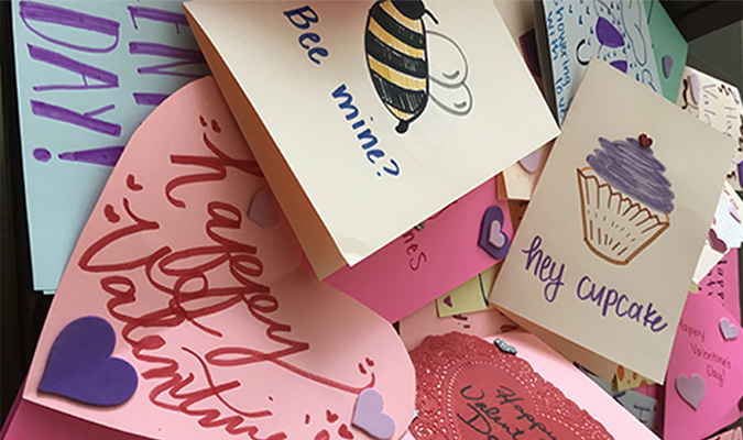A pile of Valentine's Day cards created by Honors students for a local seniors' center