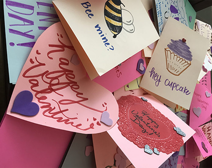 A pile of Valentine's cards designed by Honors students