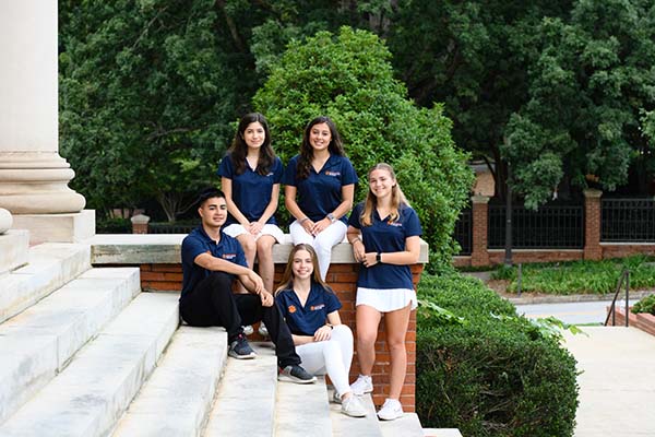 The 2022 Breakthrough Scholars Cohort posing together on a set of stairs. 