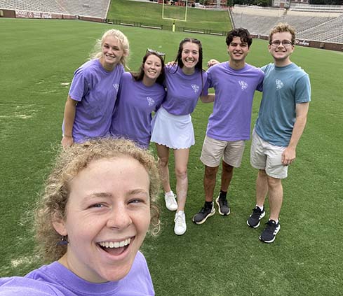 EUREKA! 2022 participants posing together on the Clemson University soccer field.