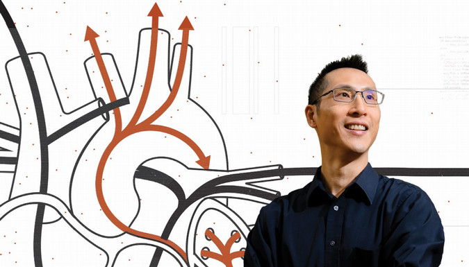 Engineer standing in front of heart diagram