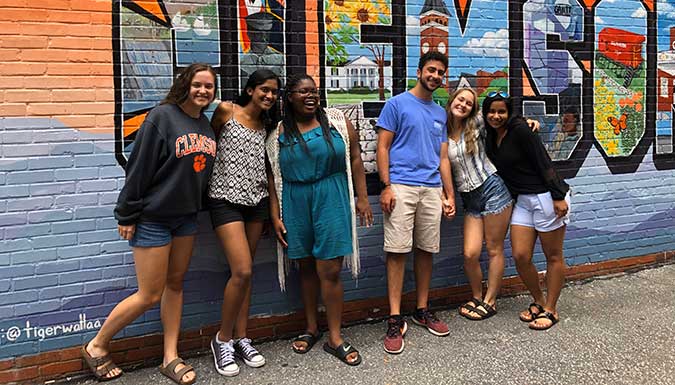 2019 EUREKA! students posing in front of the Clemson mural in downtown Clemson