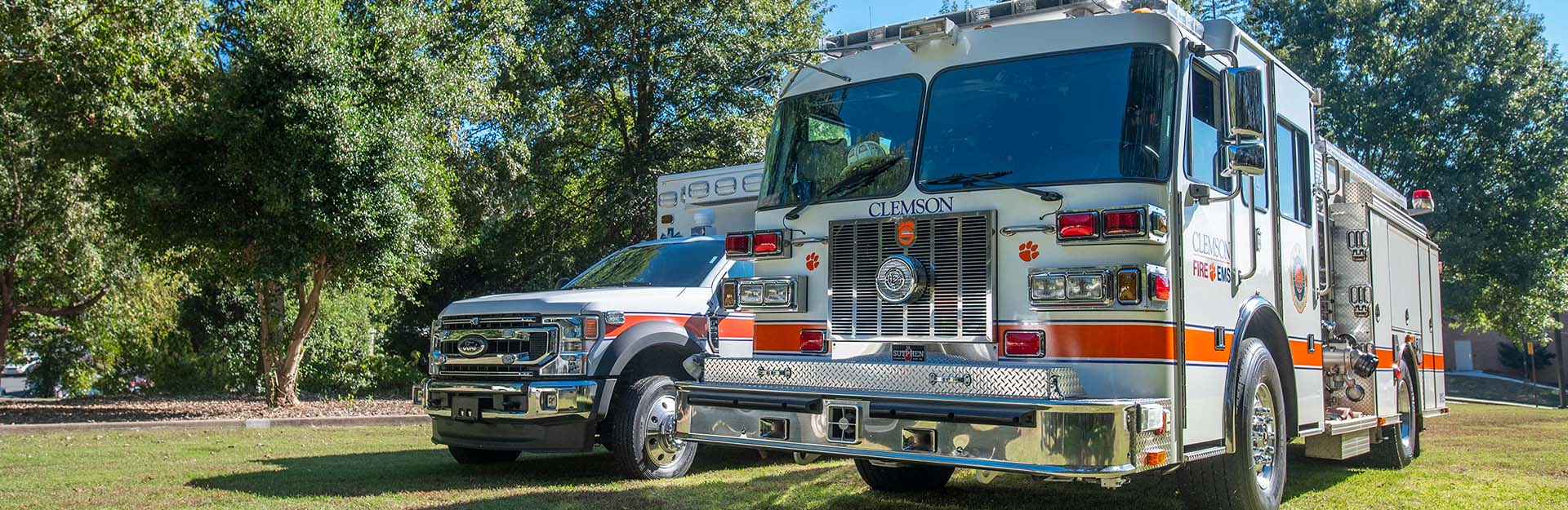 Ambulance and fire truck parked on campus