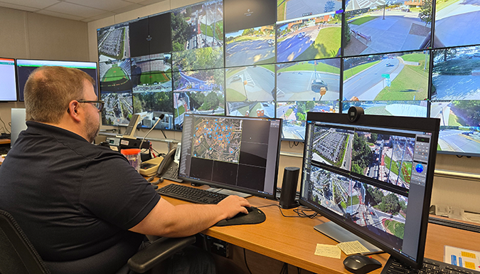 A security specialist monitors the campus surveillance system.