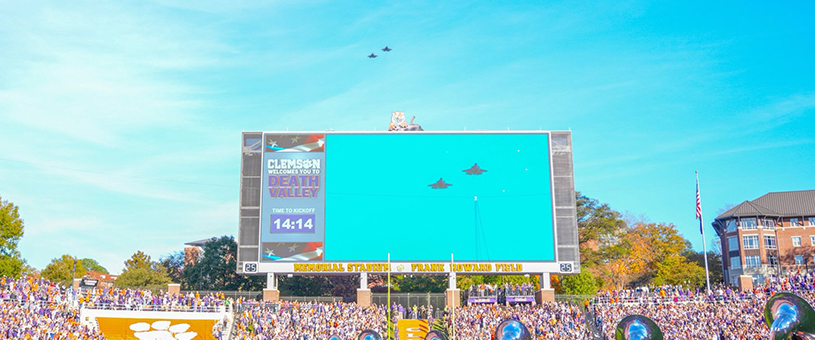 Two fighter jets fly over Clemson's Memorial Stadium during a football game