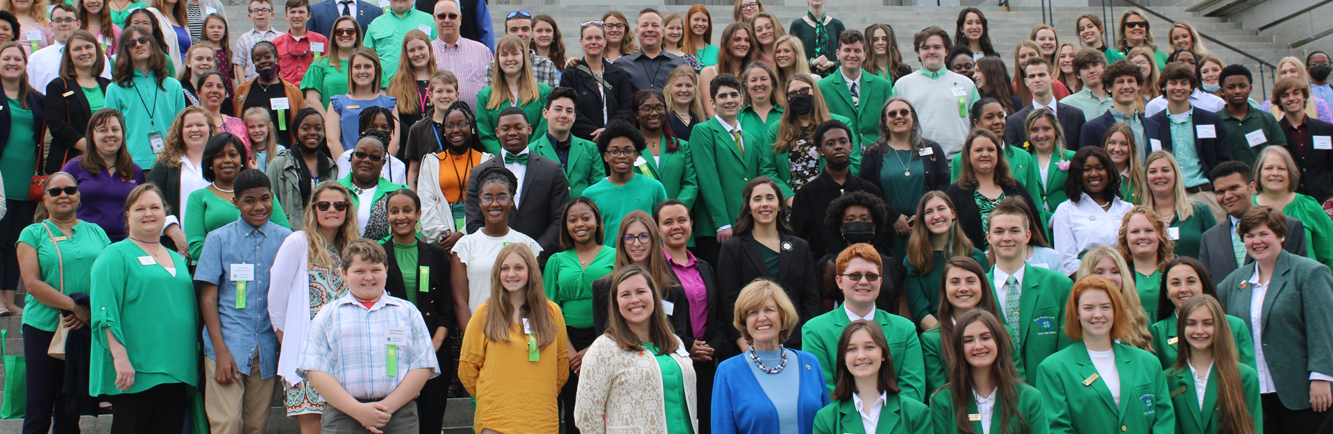 large group photo of pinckney leadership students standing on the south caorolina statehouse steps