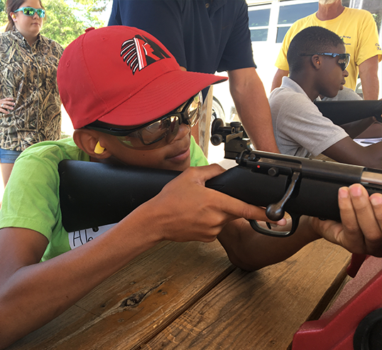 boy with rifle