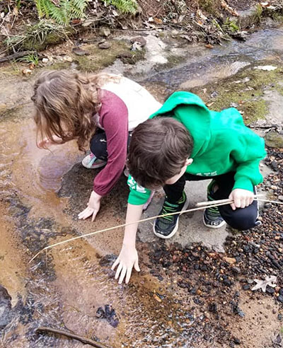 Kids in creek