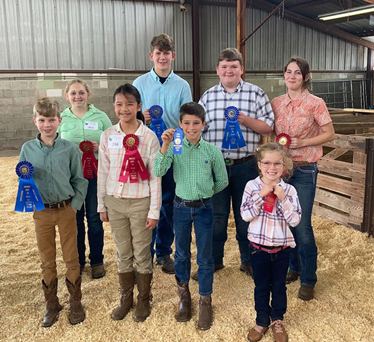 show winners with their ribbons