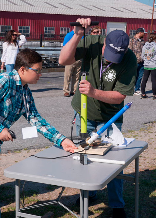 children shooting rocket