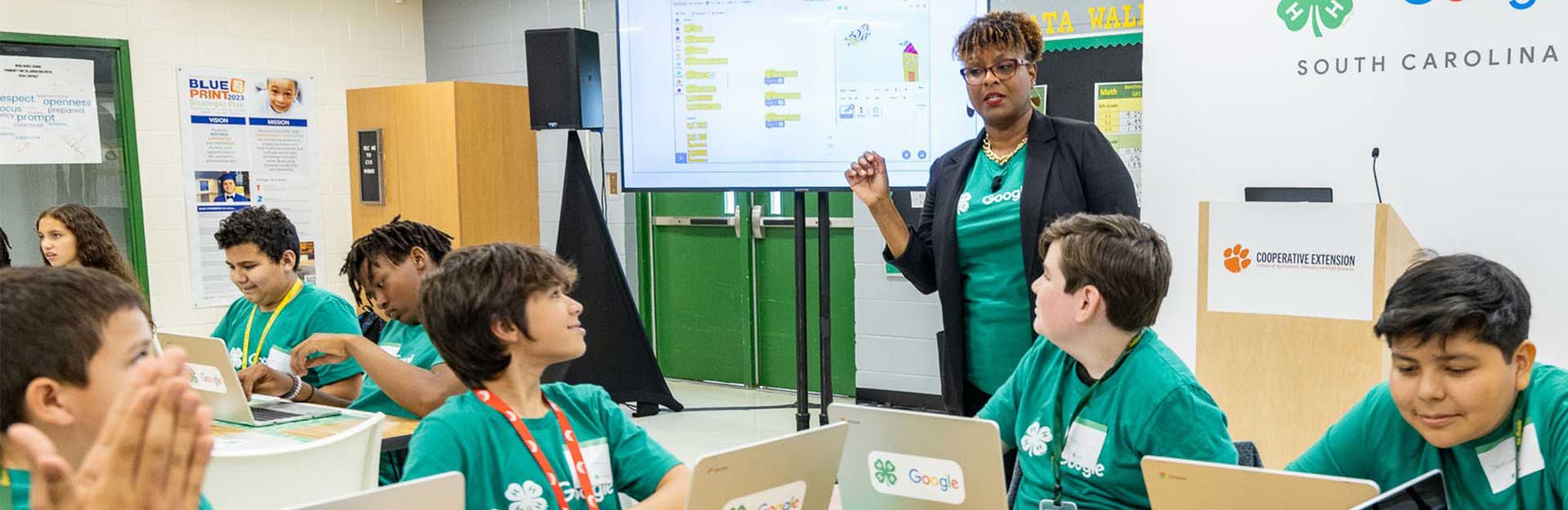 Children working on computers at Google event