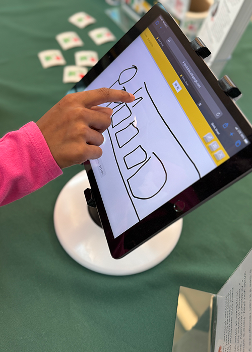 student working on iPad