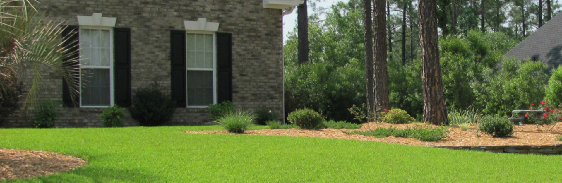 Brick home exterior and lawn