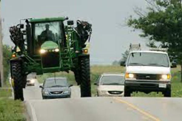 tractor on an active road
