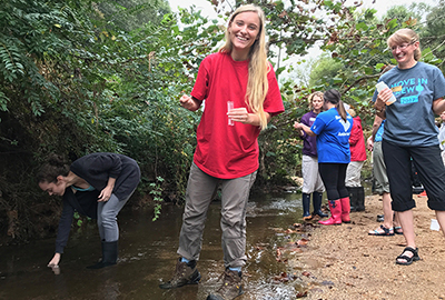 volunteers collecting water samples