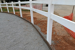 border of the all weather arena keeps footing from leaking out