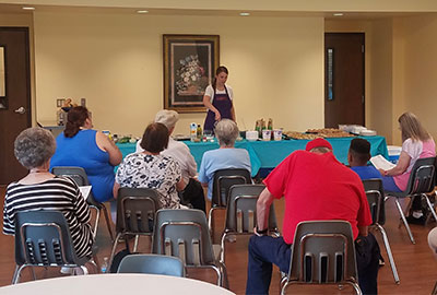 Extension agent leading a class