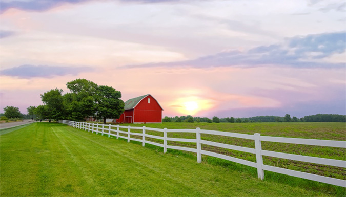 field with a barn