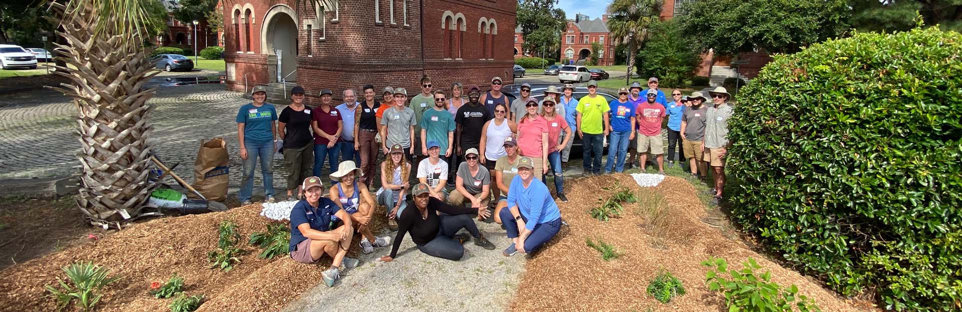 master rain gardener group after installing a rain garden