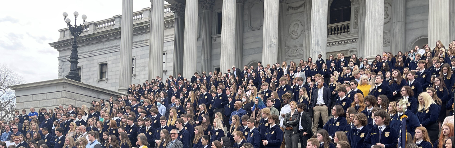 large gathering of ffa students on sc statehouse stairs