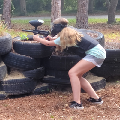 ffa middle school camp girl aiming an air soft gun