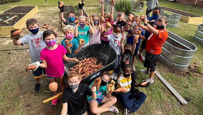 Group of kids in school garden